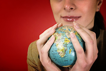 Image showing Globe in a girl's hands