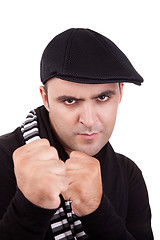 Image showing Angry man punching fist 