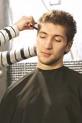 Image showing Man at barbers shop