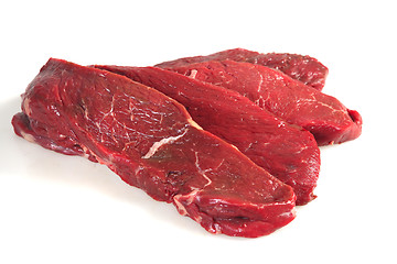 Image showing Rump steaks over white