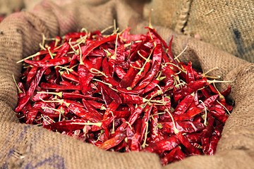 Image showing Dried chillies in a sack