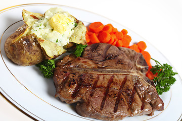 Image showing T-bone steak dinner