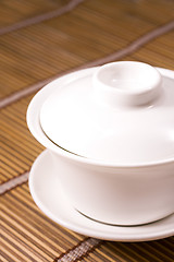 Image showing teacup on wooden table 