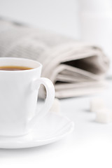 Image showing coffee, sugar and stack of newspapers