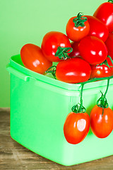 Image showing container with fresh tomatoes 