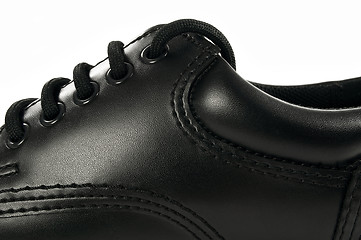 Image showing Black leather shoe.