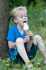 Image showing Enjoying an icecream