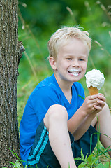 Image showing Enjoying an icecream