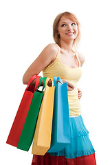 Image showing Smiling girl with colorful bags