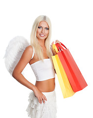 Image showing Angel woman with shopping bags,