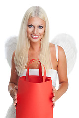 Image showing Blond angel with shopping bag