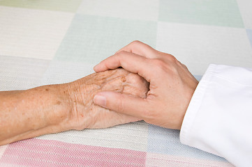 Image showing doctor and elderly patient