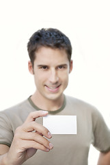 Image showing Man holding blank card