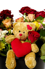 Image showing Teddy bear and roses