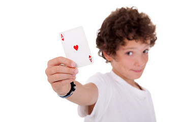 Image showing cute boy showing an ace of hearts
