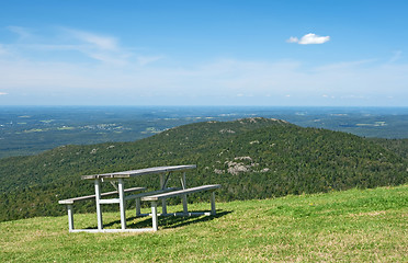 Image showing Picnic table in mountains