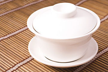 Image showing teacup on wooden table 