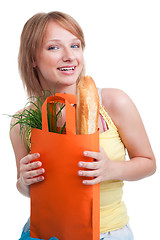 Image showing Happy blonde with baguette