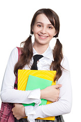 Image showing Happy teen girl with books