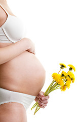 Image showing Pregnant woman with dandelion