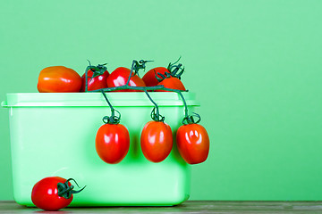 Image showing container with fresh tomatoes