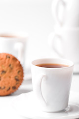 Image showing cups of coffee and muffin