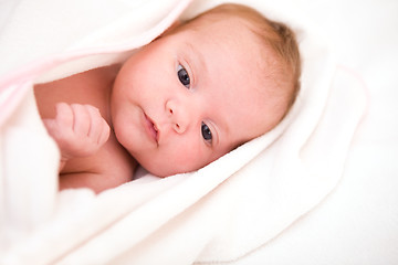 Image showing baby after bath in towel. soft focus
