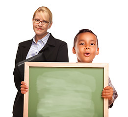 Image showing Hispanic Boy Holding Chalk Board and Female Teacher Behind