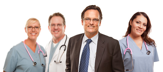 Image showing Smiling Businessman with Male and Female Doctors and Nurses
