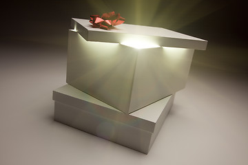 Image showing Red Bow Gift Box Lid Showing Very Bright Contents