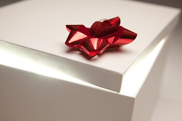 Image showing Red Bow Gift Box Lid Showing Very Bright Contents