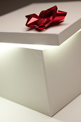 Image showing Red Bow Gift Box Lid Showing Very Bright Contents