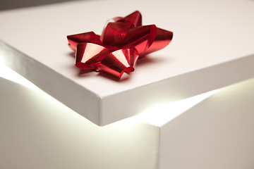 Image showing Red Bow Gift Box Lid Showing Very Bright Contents