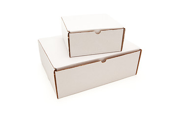 Image showing Stack of Blank White Cardboard Boxes Isolated