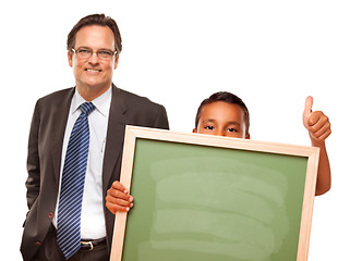 Image showing Hispanic Boy Holding Chalk Board with Male Teacher Behind