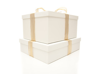 Image showing Stacked White Gift Boxes with Gold Ribbon Isolated