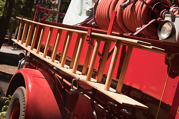 Image showing Vintage Fire Truck with Latter and Hose