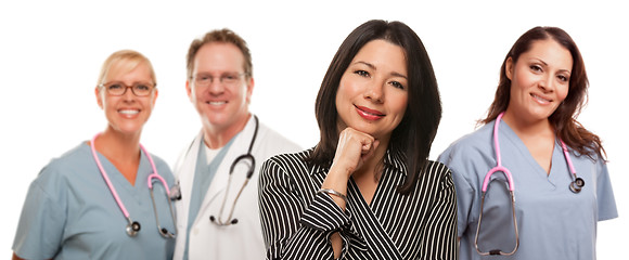 Image showing Hispanic Woman with Male and Female Doctor or Nurse