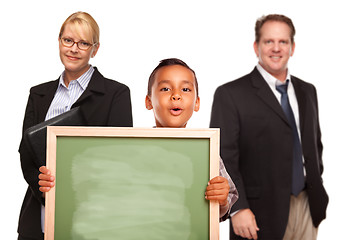 Image showing Hispanic Boy Holding Chalk Board with Teachers Behind