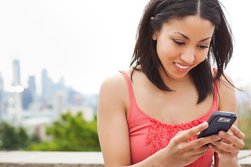 Image showing Woman texting