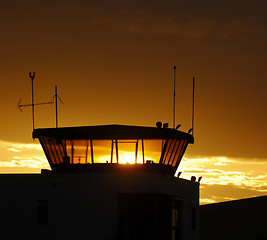 Image showing Air traffic control tower on sunset sky