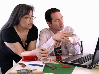 Image showing Coworkers at Desk