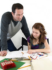 Image showing Dad helps Daughter Study