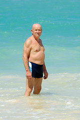 Image showing Senior man in water