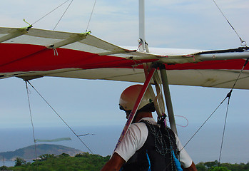 Image showing Hang glider preparing to jump