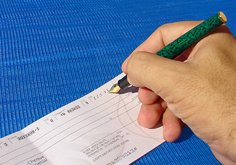 Image showing FIlling a check