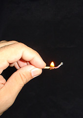Image showing lighted match