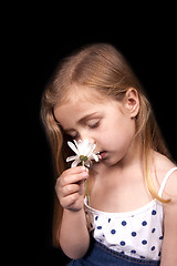 Image showing Girl with flower