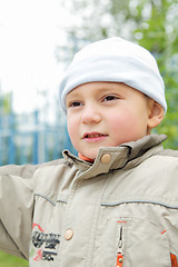 Image showing Little  boy looking sideways