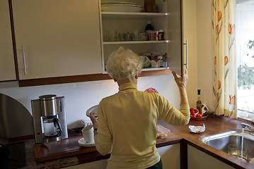 Image showing Senior in her kitchen